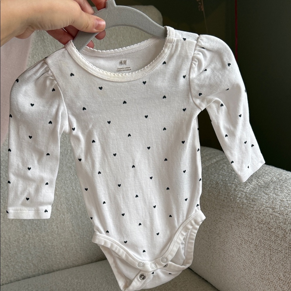 H&M White Bodysuit with Black Heart Pattern